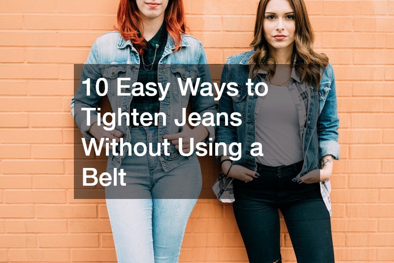 two women wearing denim jackets and jeans with their shirts tucked in